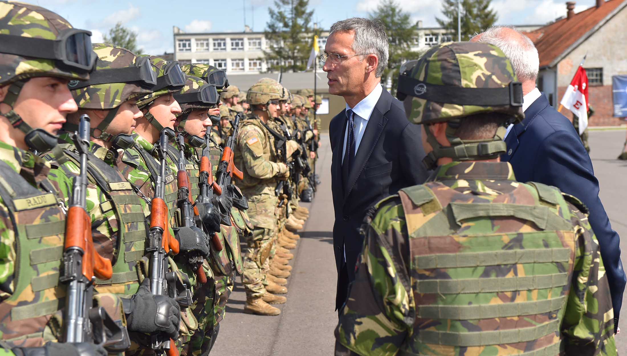 NATO Secretary General Jens Stoltenberg inspects troops