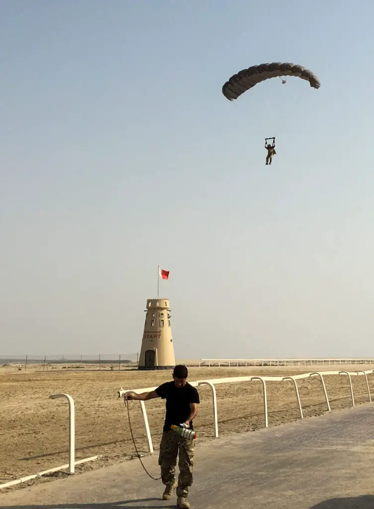Bahrain Defense Forces paratrooper descends