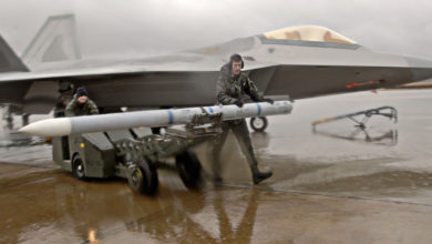 M120 AIM-9 missile and an F-22A Raptor