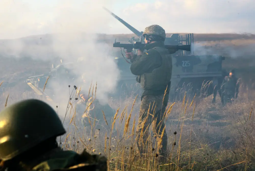 A Ukrainian soldier assigned to 1st Battalion, 92nd Mechanized Brigade, fires a rocket propelled grenade during a platoon live-fire exercise