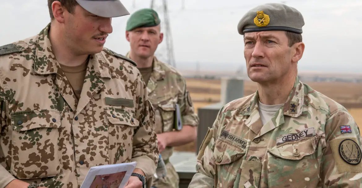 Major General Felix Gedney reviews coalition training in Iraq