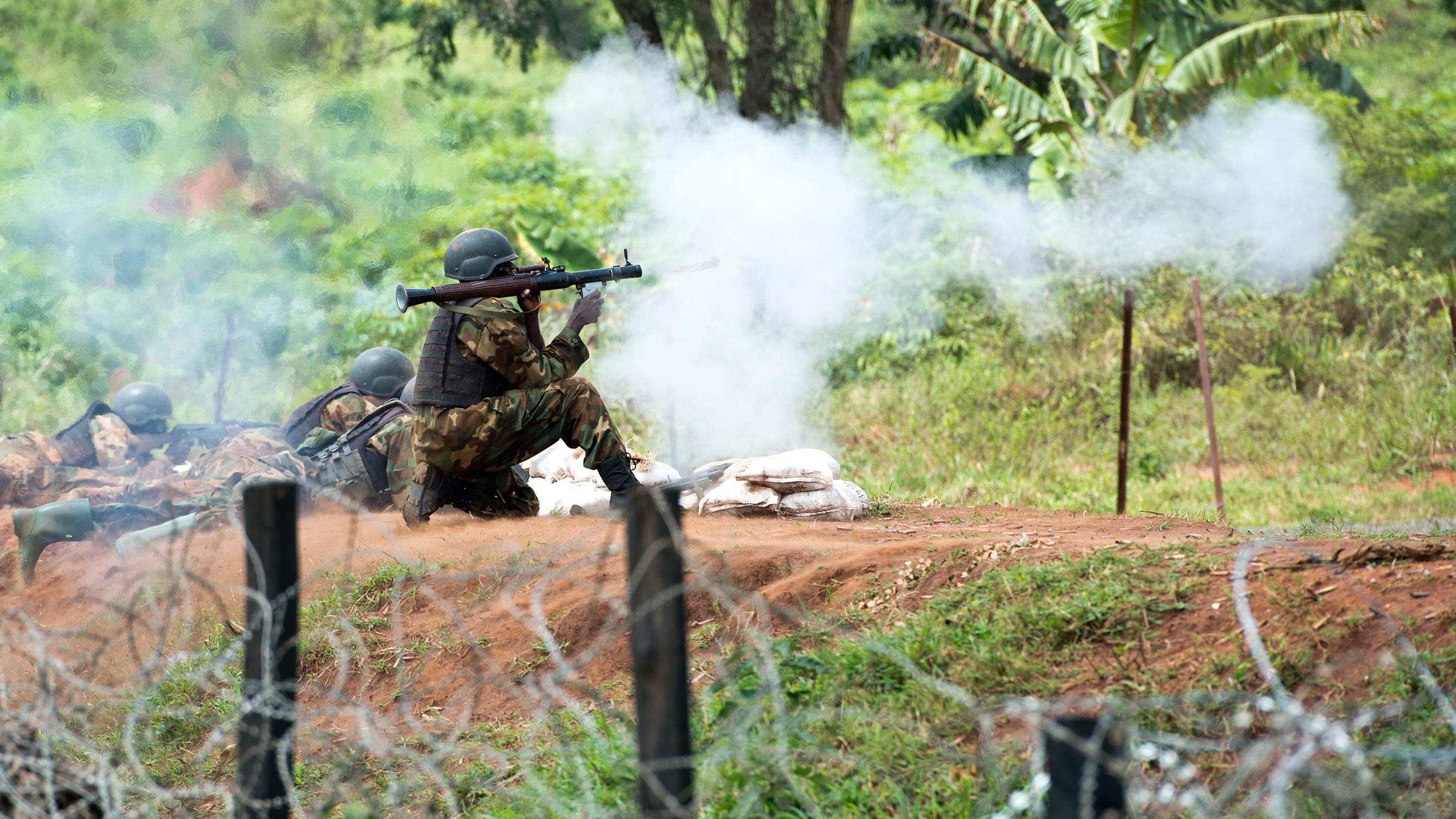 Ugandan People’s Defence Force soldier fires an RPG