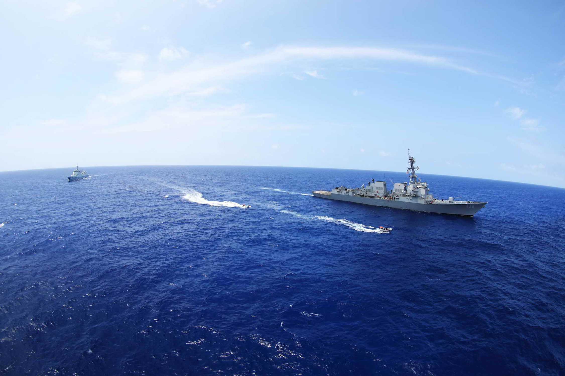 The Chinese Navy guided-missile destroyer Xi’an (153) participates in a maritime interdiction event with the guided missile destroyer USS Stockdale (DDG 106), during Rim of the Pacific (RIMPAC) 2016.