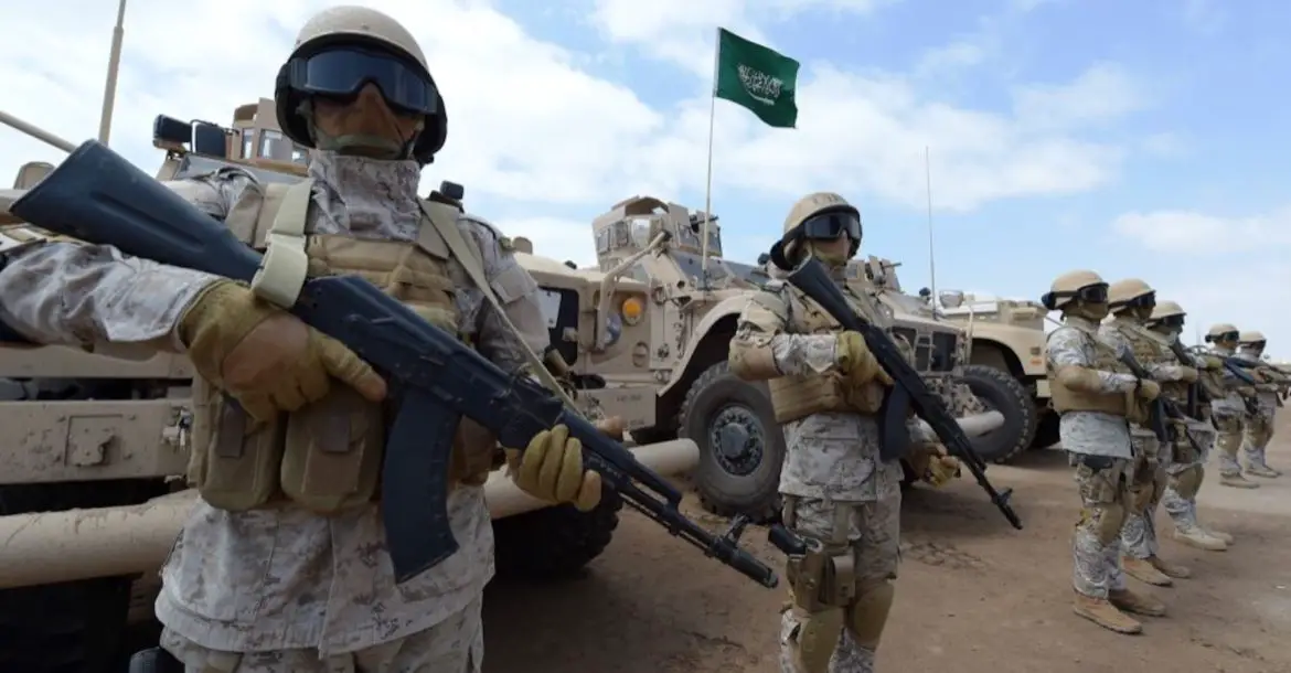 Saudi forces take part in military exercises during a visit by Yemeni Prime Minister Khaled Bahah at the Saudi-led coalition military base in Yemen's southern embattled city of Aden.