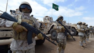 Saudi forces take part in military exercises during a visit by Yemeni Prime Minister Khaled Bahah at the Saudi-led coalition military base in Yemen's southern embattled city of Aden.