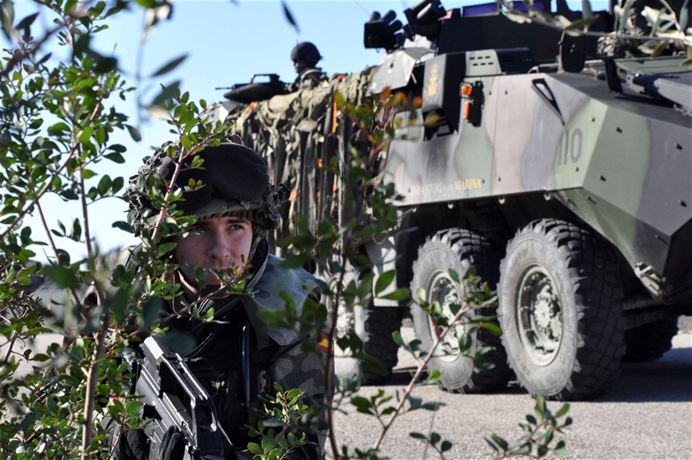A Spanish marine performs security while conducting convoy training during Exercise LISA AZUL