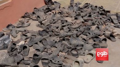 Shoes of victims of an Afghan Air Force airstrike at a religious school in a Taliban-controlled part of Dasht-e-Archi, Kunduz province