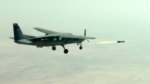 Iraqi C-208B Combat Caravan fires Hellfire missile