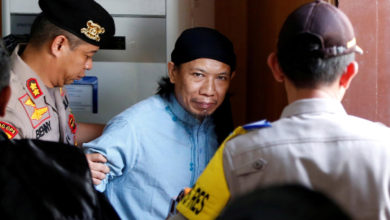 Indonesian cleric Aman Abdurrahman leaves court after death sentence