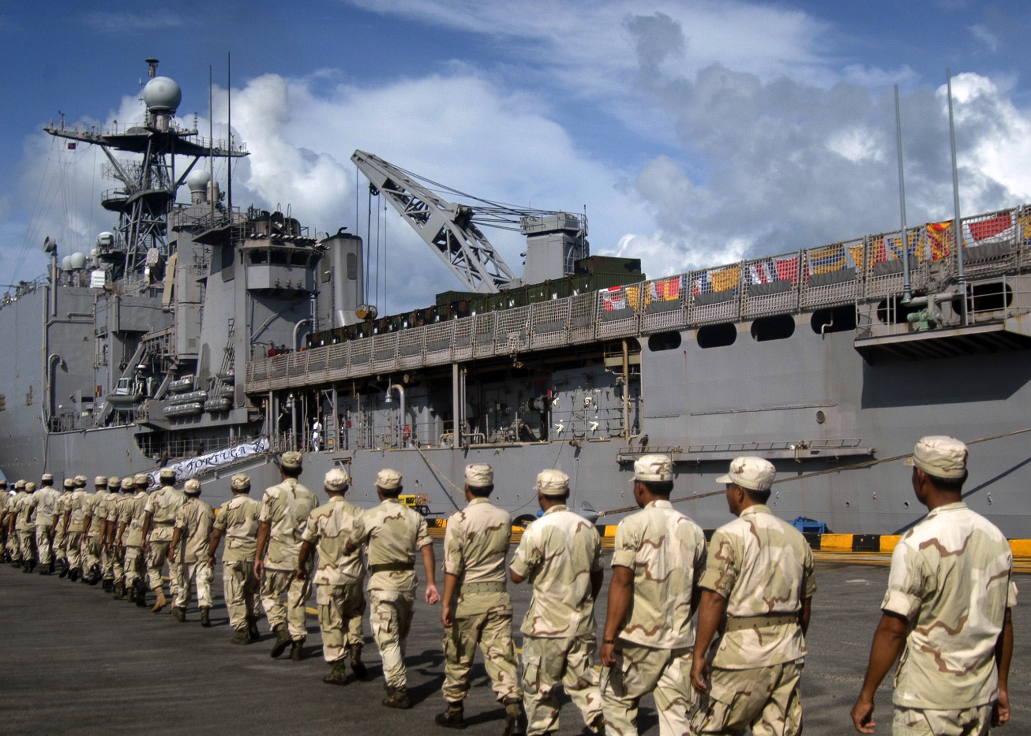Royal Cambodian Marines embark aboard the amphibious dock landing ship USS Tortuga