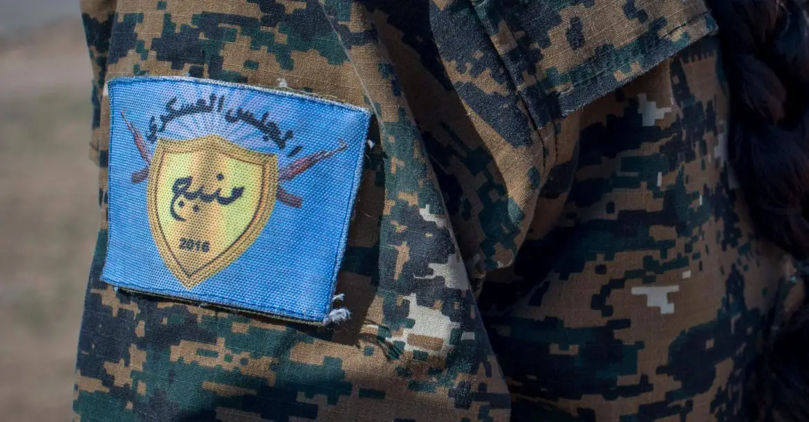 Local female Manbij Military Council trainees learn marksmanship training