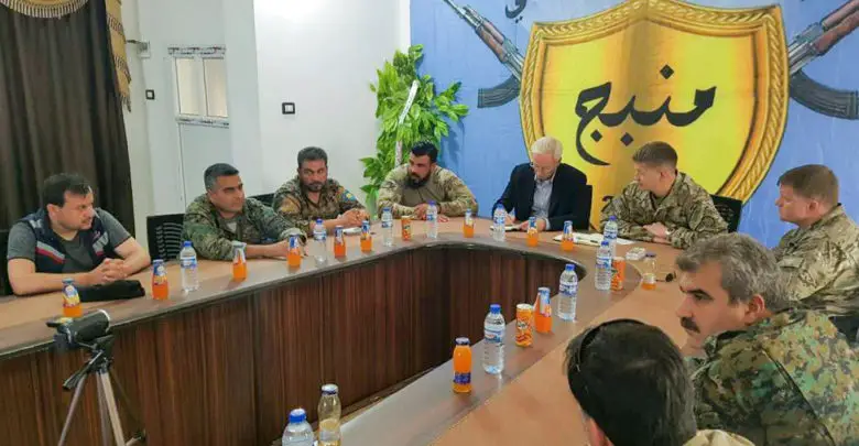 US and Coalition representatives meet with Manbij Military Council officials in Manbij, Syria