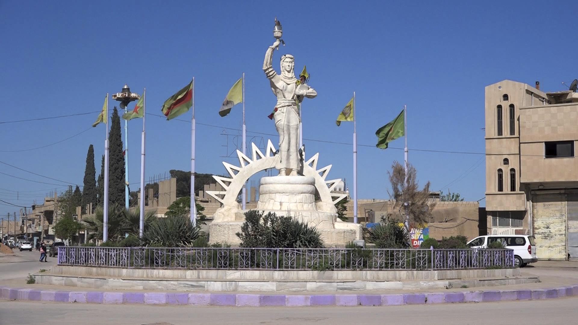 The Statue of the Free Woman at the entrance of Amude, 20 miles west of Qamishli, Syria
