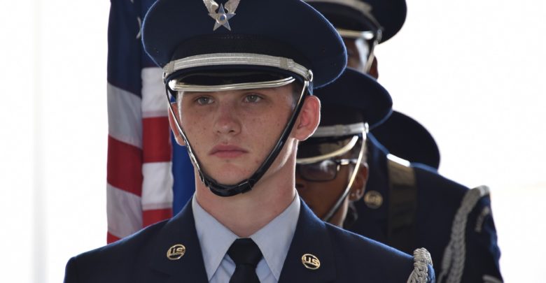US Air Force Airman 1st Class Kalib Bailey, 325th Fighter Wing Honor Guard member, stands at attention prior to the 325th Medical Group change of command ceremony