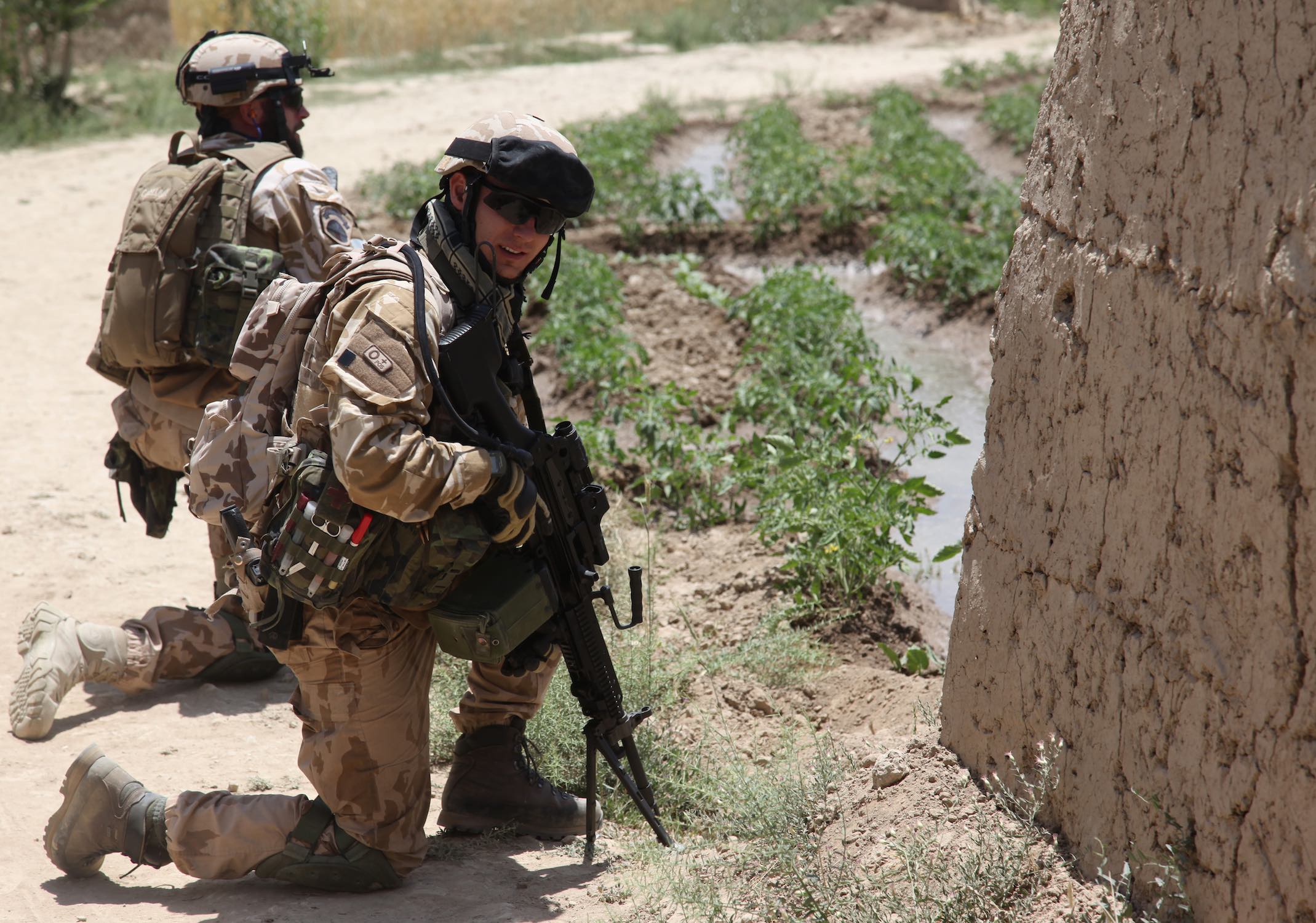 Soldiers from the Czech Republic provide security during a route clearance mission in the Baraki Barak district of Logar province, Afghanistan