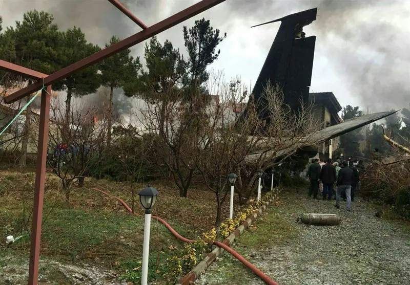 Aftermath of an Iran army Boeing 707 cargo plane crash near Tehran