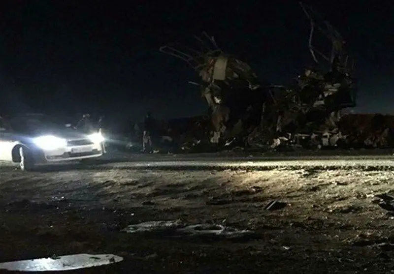Cars at the scene of a roadside bomb attack on IRGC