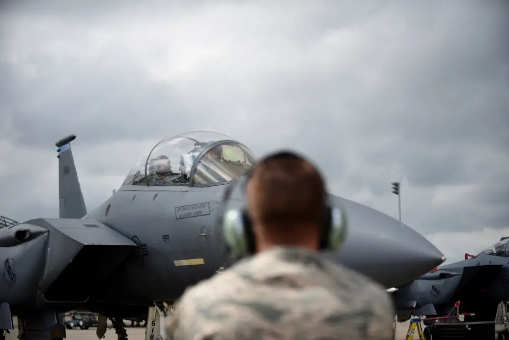 Qatari defense official prepares to fly WSO in F-15E