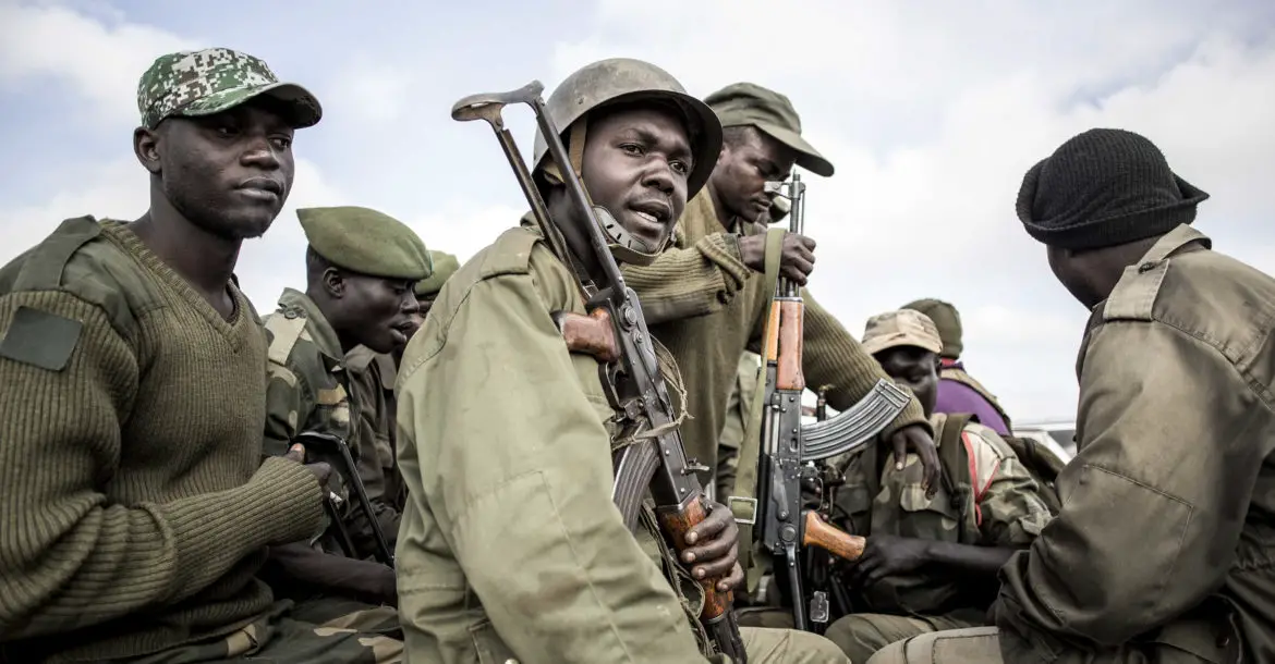 Soldiers of the Armed Forces of the Democratic Republic of the Congo (FARDC) prepare to escort health workers attached to ebola response programs on May 18, 2019 in Butembo, north of Kivu