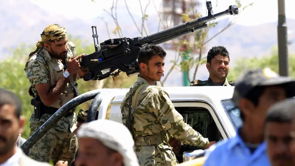 Houthi fighters guard a pro-rebel gathering in Sanaa on September 27, 2018
