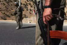 A 2018 file photo shows fighters of the Kurdistan Workers' Party (PKK) manning a roadblock in the Qandil Mountains, the groups's main rear-base in northern Iraq