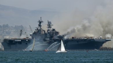 A fire burns on the amphibious assault ship USS Bonhomme Richard at Naval Base San Diego on July 12, 2020 in San Diego, California. There was an explosion on board the ship with multiple injuries reported