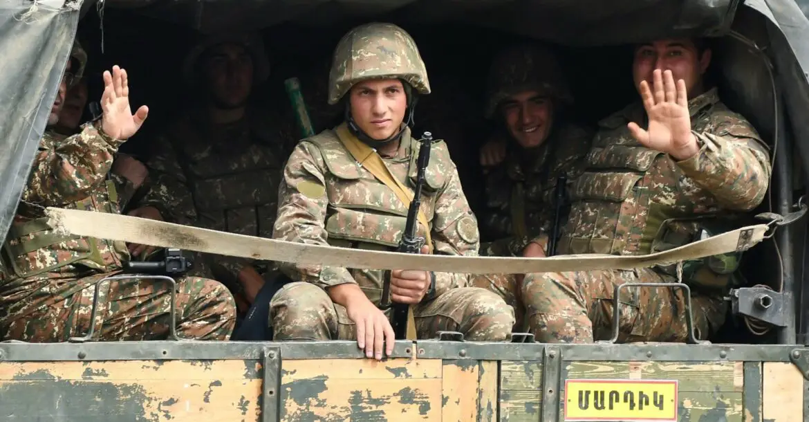 Armenian soldiers on the back of a truck