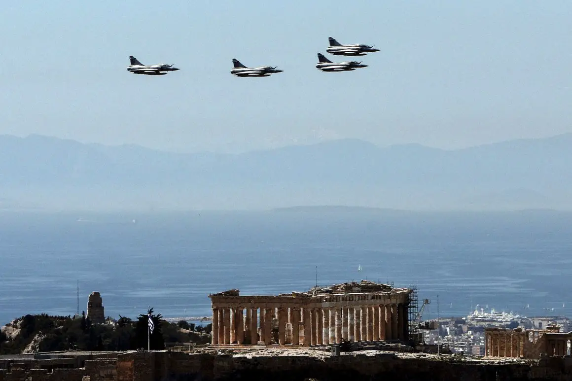Fighter jets fly over the Parthenon at the Acropolis on March 25, 2017 in Athens, during a military parade marking Greece's Independence Day.