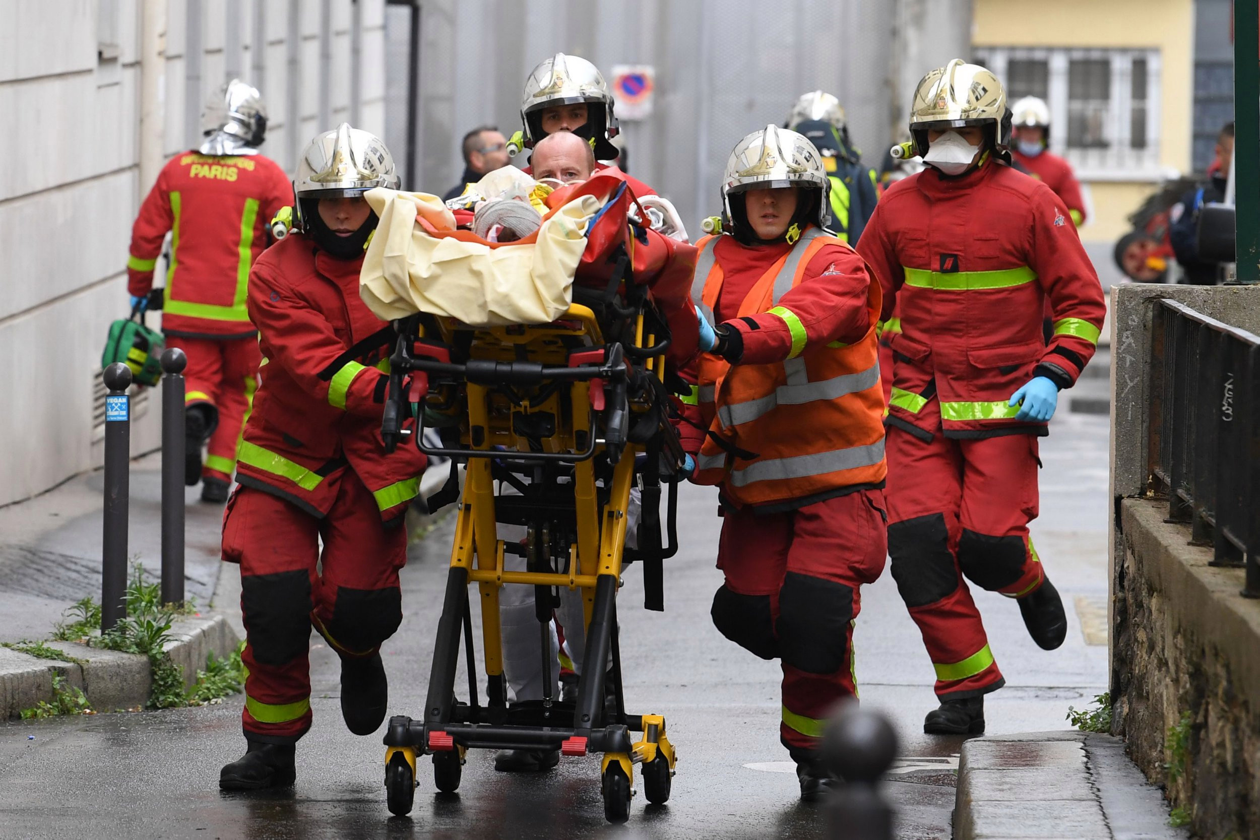 Photo of medical workers in Paris after a knife attack killed two