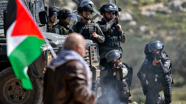 Israeli security forces keep position during clashes with Palestine.