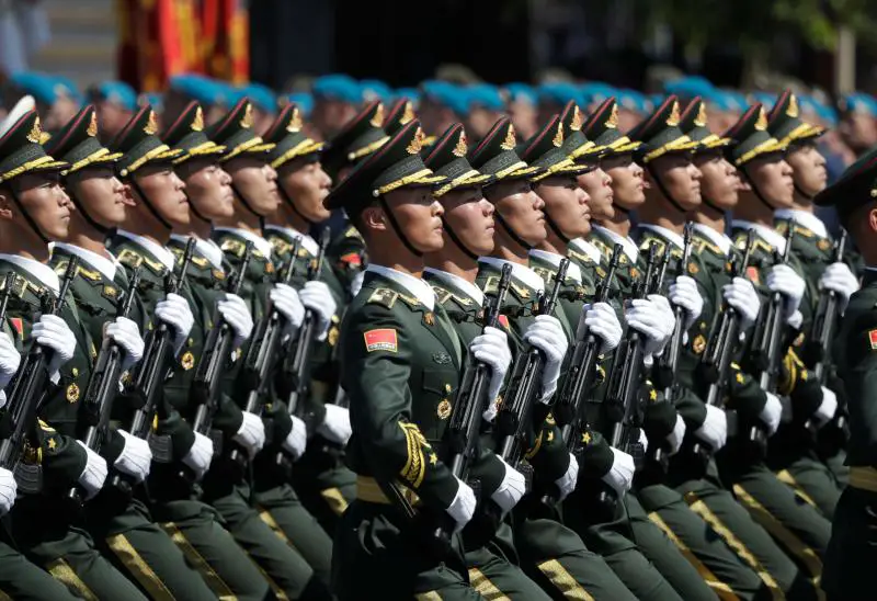 Chinese military troops march on.