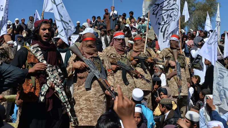 Taliban militants celebrating the agreement signed with the US