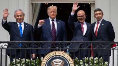 Israeli Prime Minister Benjamin Netanyahu, US President Donald Trump, Bahrain Foreign Minister Abdullatif al-Zayani, and UAE Foreign Minister Abdullah bin Zayed Al-Nahyan wave from the Truman Balcony at the White House after they participated in the signing of the Abraham Accords.