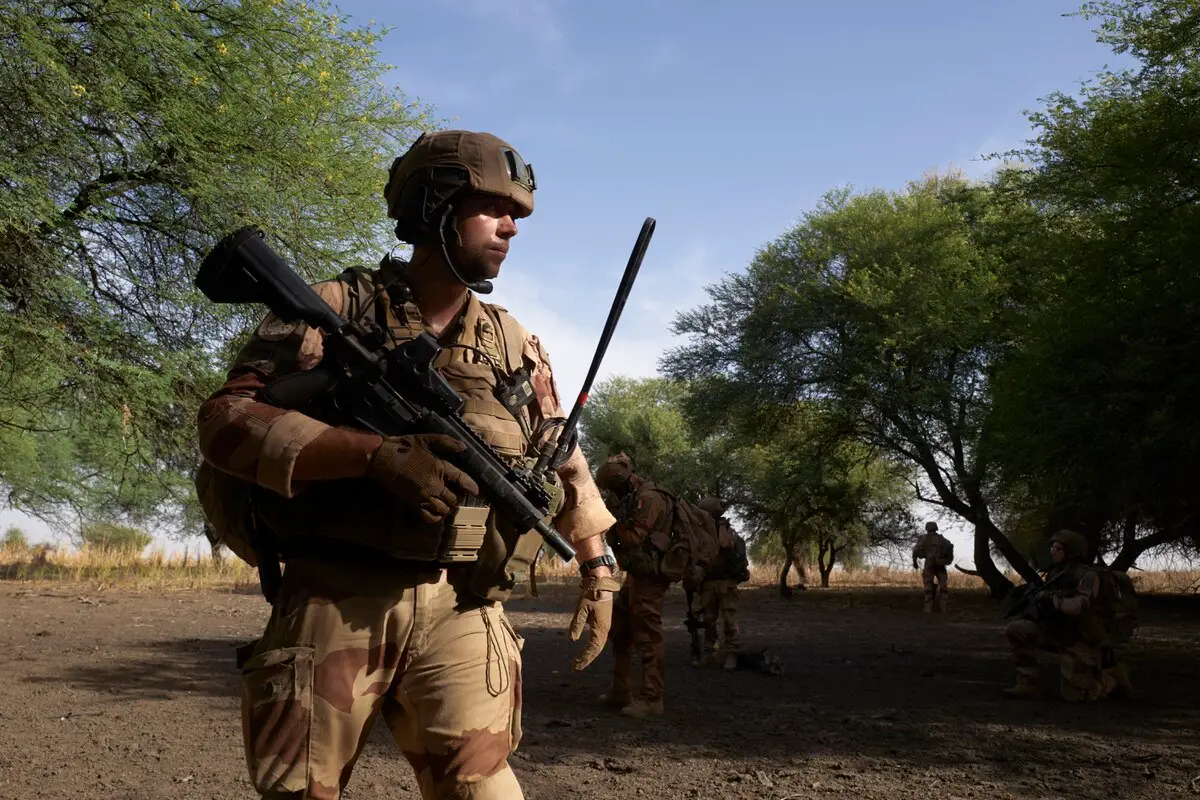 A group of soldiers of the French Army patrols the forest of Tofa Gala during the Bourgou IV operation in the Sahel region in northern Burkina Faso on November 9, 2019