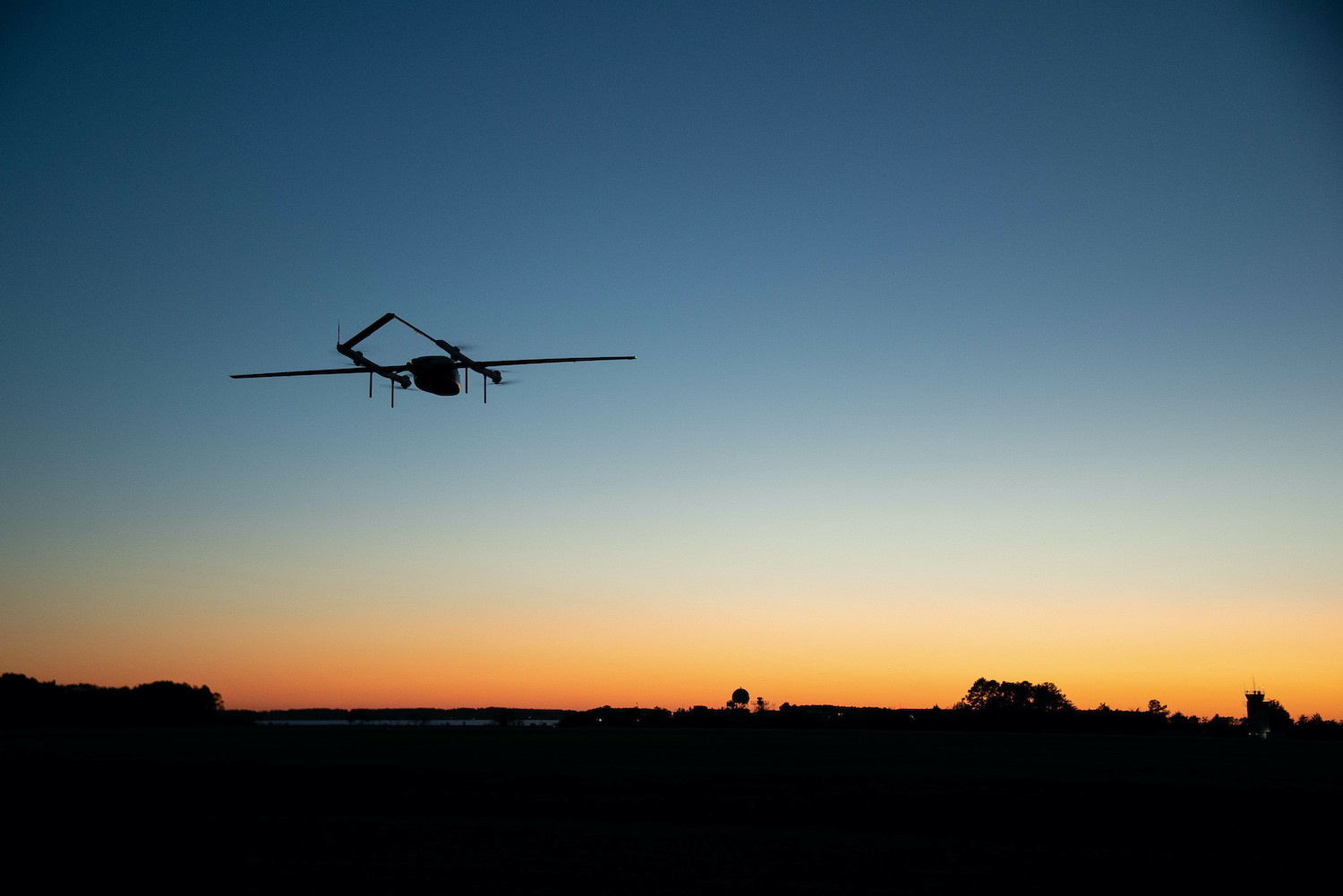 An autonomous vehicle dubbed Blue Water Maritime Logistics UAS flies over Unmanned Air Test and Evaluation (UX) 24 during a demonstration flight at Naval Air Station Patuxent River November 4, 2020.