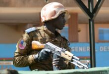 A military personnel stands outside the headquarters of the country's defence forces in Ouagadougou on March 3, 2018 a day after dozens of people were killed in twin attacks on the French embassy and the country's military.