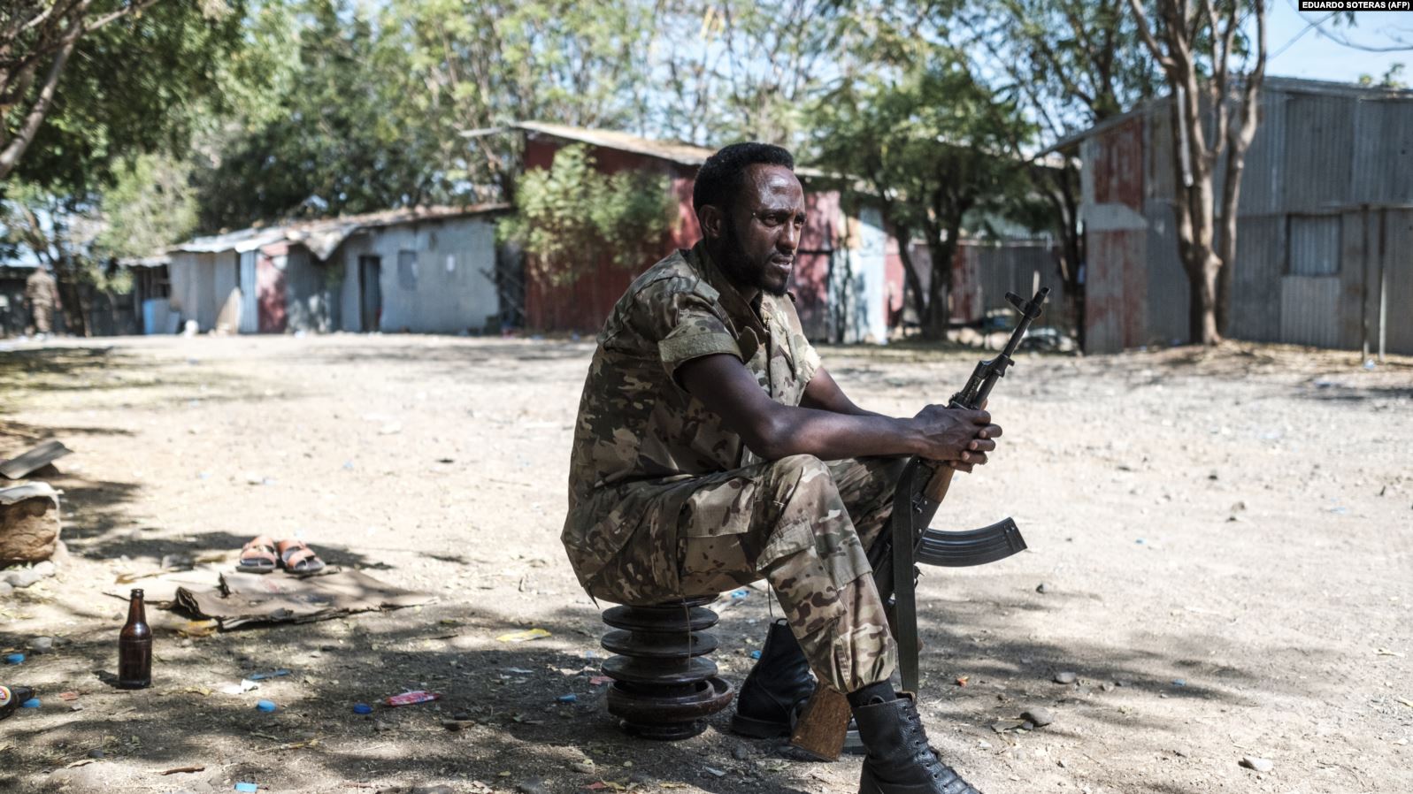 An Ethiopian soldier sits at the 5th Battalion of the Northern Command of the Ethiopian Army in Dansha, Ethiopia, on November 25, 2020