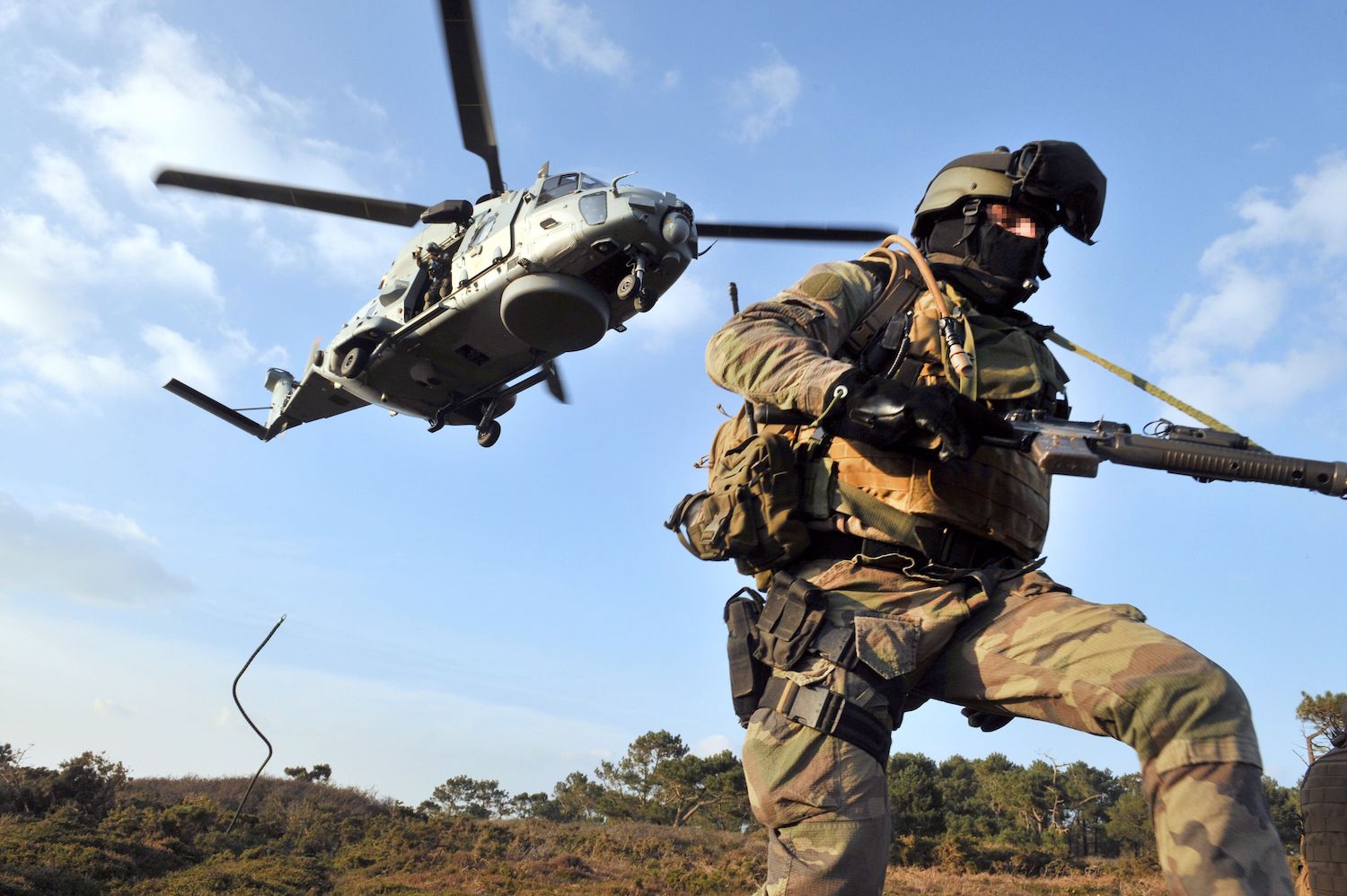 A soldier of French Jaubert naval commando pictured after getting off a NH90 “Caiman” helicopter during an exercise