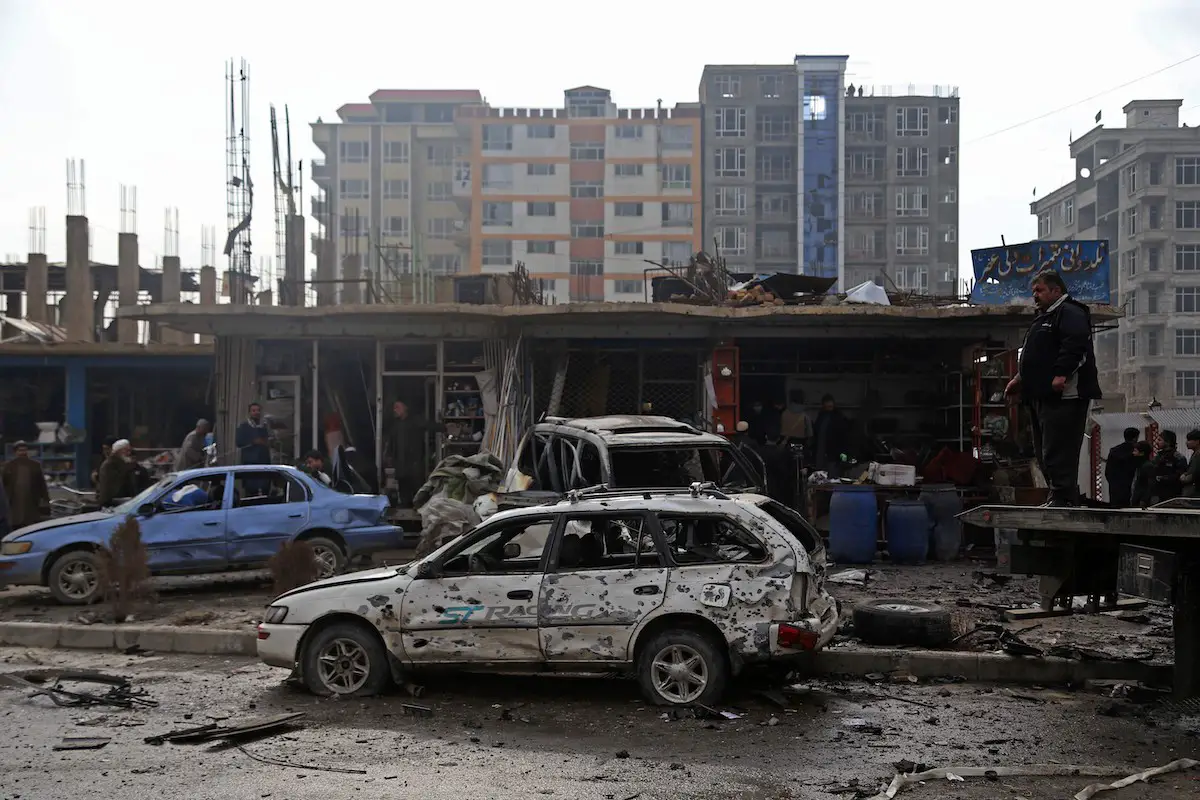 Damaged cars at the site of an attack in Kabul, Afghanistan, on Sunday, December 20, 2020