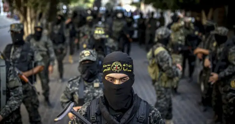 Members of the Palestinian Islamic Jihad movement march during a military parade in Gaza City on October 4, 2018