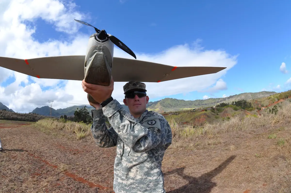 US soldier throwing a PUMA drone.