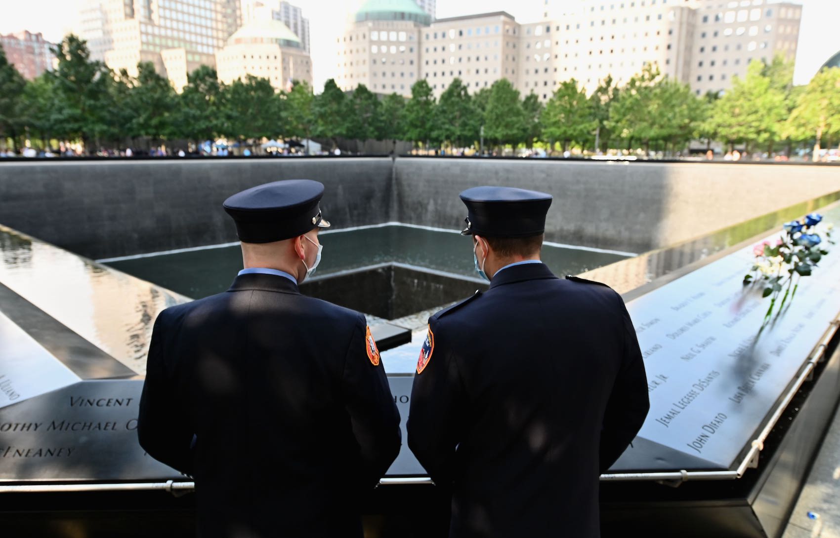 New York Firefighters gather at the 9/11 Memorial & Museum in New York on September 11, 2020, as the US commemorates the 19th anniversary of the 9/11 attacks