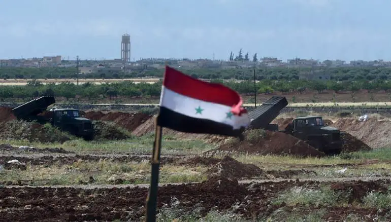 A battery of the Syrian Army's Russian made the BM-21 multiple rocket launcher is visible in Hama province, in the northwest of Syria on May 4, 2016.