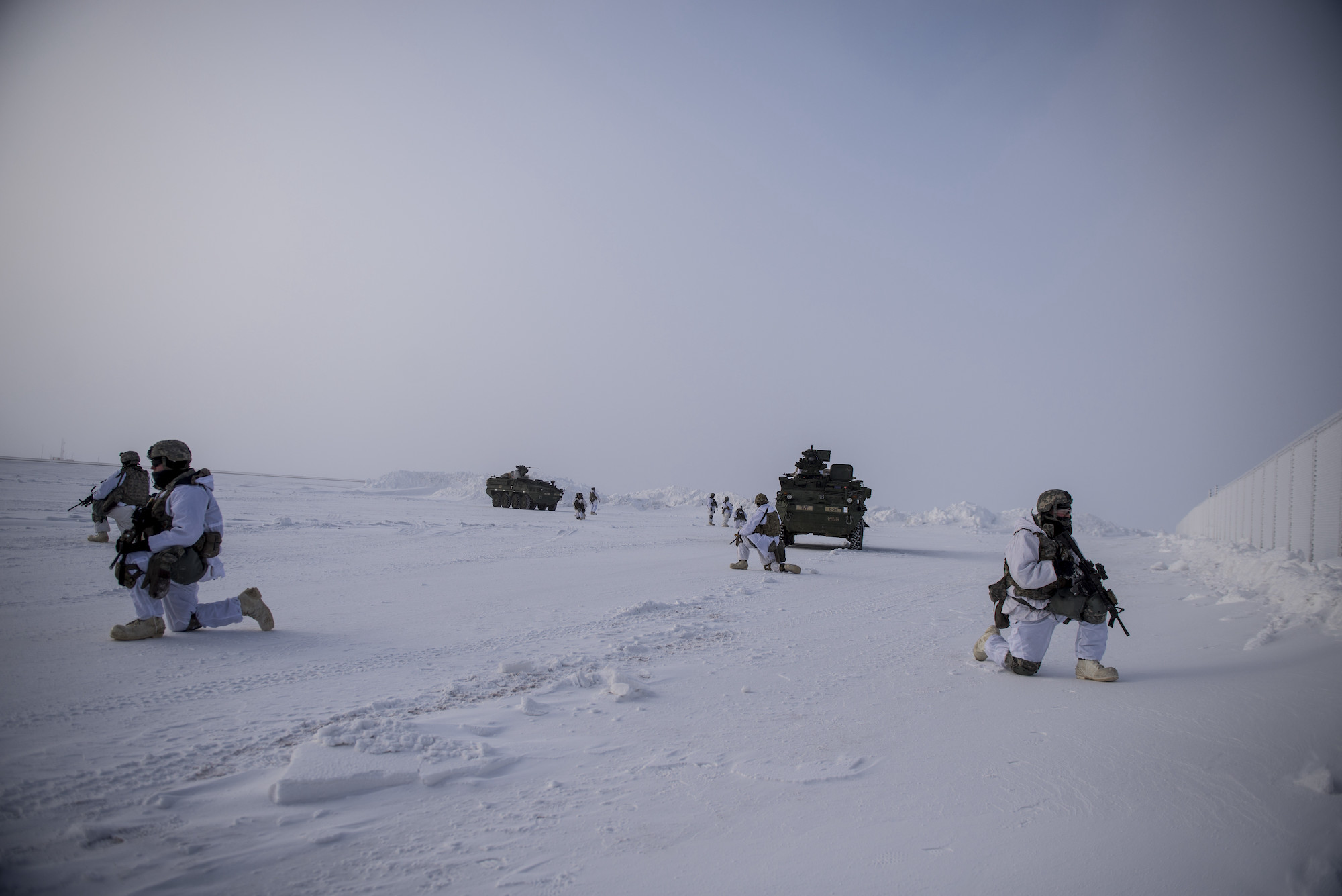 US Soldiers assigned to 3rd Battalion, 21st Infantry Regiment provide overwatch during an arctic deployment of Stryker armored vehicles as part of the US Army Alaska led exercise Arctic Edge 18 at Eleison Air Force Base, Alaska, March 13, 2018.