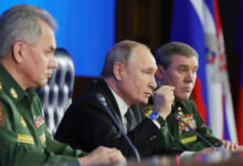 Russian President Vladimir Putin with Defense Minister Sergei Shoigu