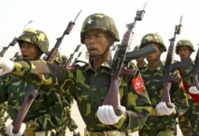 Myanmar soldiers seen marching in formation.