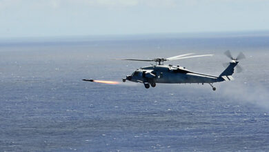 Helicopter fires AGM-114 Hellfire II missile during RIMPAC