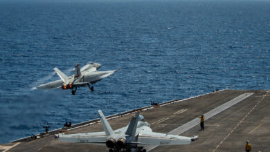 An F/A-18E Super Hornet, assigned to the “Golden Warriors” of Strike Fighter Squadron (VFA) 87, launches from the flight deck of the aircraft carrier USS Theodore Roosevelt (CVN 71) April 6, 2021.