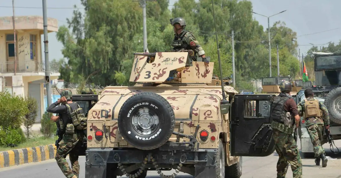 Afghan soldiers arrive in a Humvee vehicle outside a prison during a raid in Jalalabad, Afghanistan, Augustus 3, 2020.