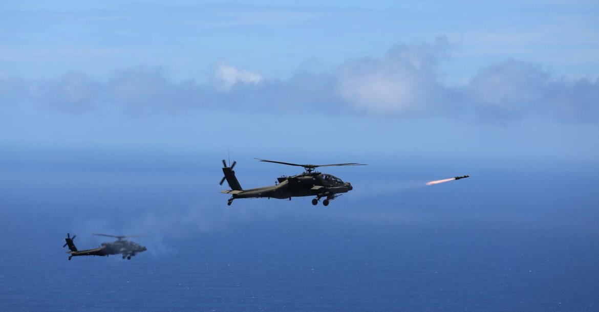 Two US Army AH-64D Apache attack helicopters launch eight "fire and forget" AGM-114L Hellfire Air to Surface Missiles during a training exercise off the coast of Oahu as part of the Rim of the Pacific in 2016.